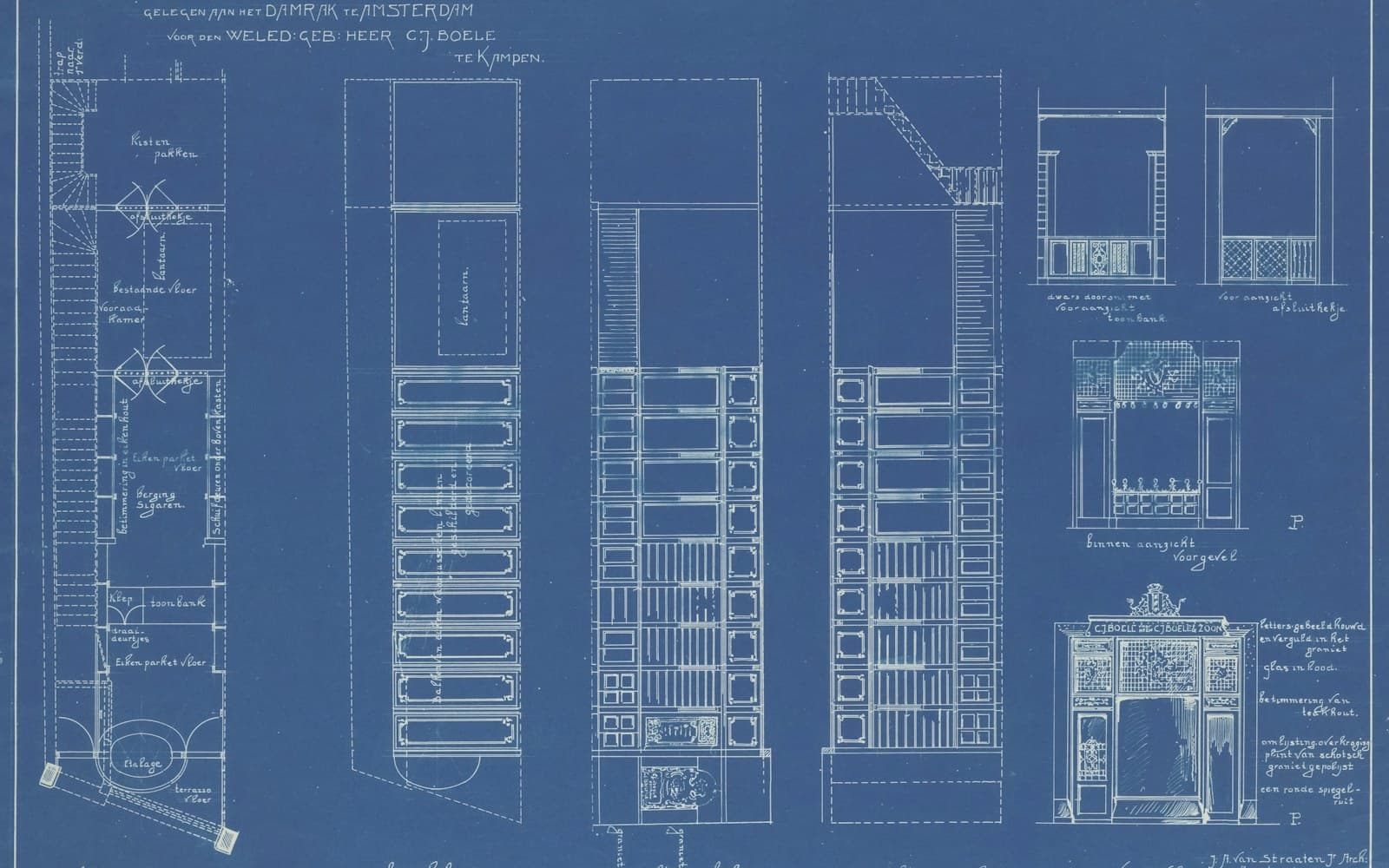 Architectural blueprint drawings in white on blue paper